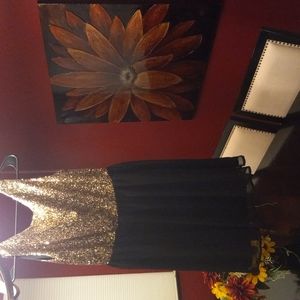 Black and gold sequence dress